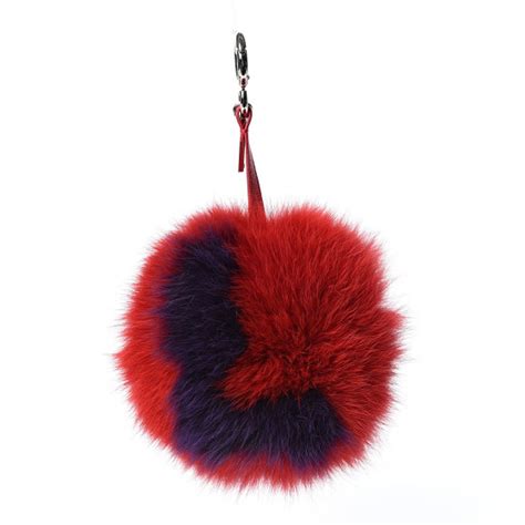 red fendi fur charm|Pom.